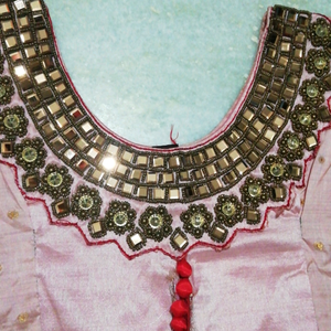It is a patiyala dress along with duppata. one time used. no damage to patiyala Pant or duppata and the top had little that the red colour buttons has a  stitching  damage.