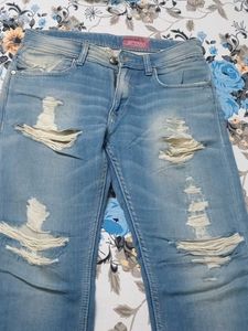Ripped Jeans - Light Wash Denim