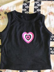 Black no sleeves crop top.