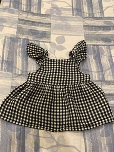 Checked top with flutter sleeves