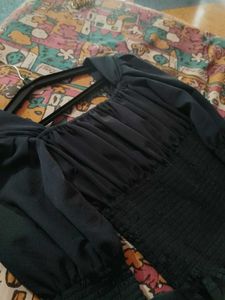 A Navy Blue Full Sleeve Top.