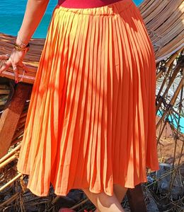Orange Pleated Skirt