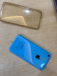 I Phone 5c With Cover and Earphones