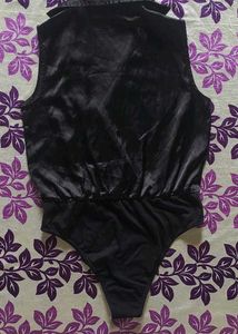 blacksatinbodysuit with a collared, wrap-style Top