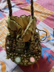 New Stylish Golden Potli Bag