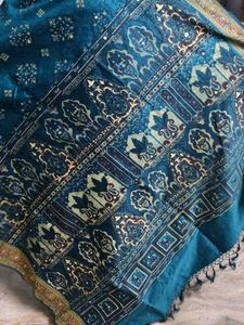 Elegant Teal Saree with Gold Accents