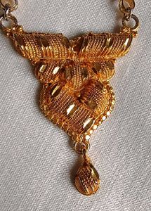 Gold plated Ghanthan