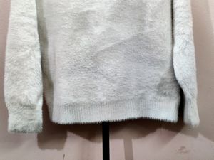 premium imported white V-neck mohair sweater.