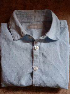 Primark half sleeves printed light blue shirt.. front button closure