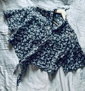 This is a floral print crop top.