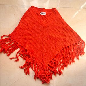 Cozy Orange Knit Poncho with Fringe