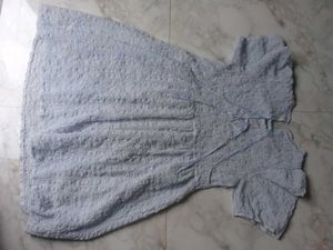 Light Blue Textured Dress With Bow Detailing
