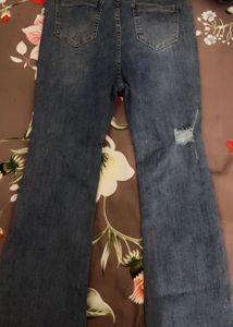 Ripped Flare Jeans