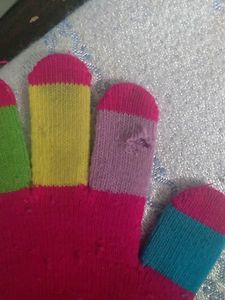 2 Sets Of Gloves ..