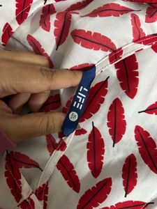 Woman’s red Leaf Print Sleeveless Top