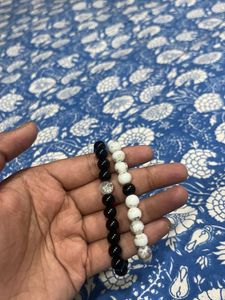 pair of two batcelets black and white