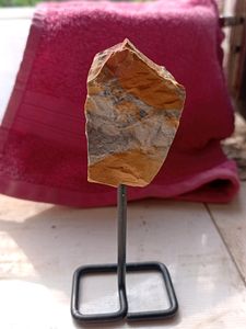 ROUGH CRYSTAL ROCK IN A STAND