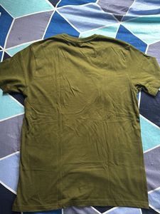 UCB … Brand New Olive Green Graphic Tee