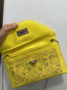 A Neon Cutwork Envelope Sling Bag