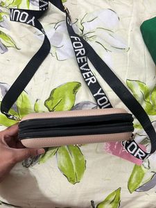 New Sling Bag In Beige Color With Long Handle