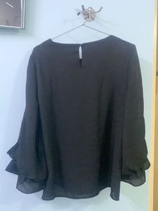 Elegant Black Top With Beautiful Sleeves