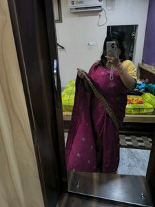 Megenta rajasthani tie-dye saree with bow blouse