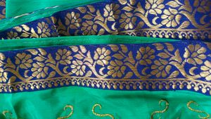 Green Colour Saree With Blue Border