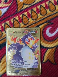Charizard Vmax Gold Pokemon Card.