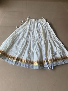 Fix price cream and golden skirt