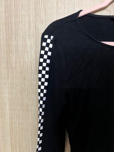 Sporty Black Bodysuit with Checkerboard Sleeves