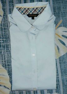 Fitted light blue shirt