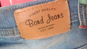 Distressed Blue Denim Jeans