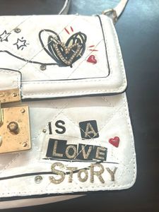 ALDO Hand Painted sling Bag( Pre Owned)