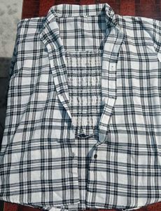 women stylish checked shirt with inner wear