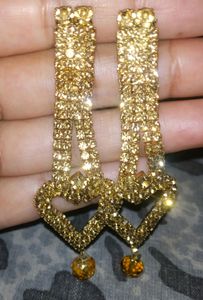 Golden and oxidized earrings