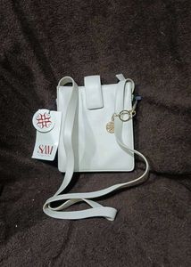 Crossbody Bag With Metal Accent Logo
