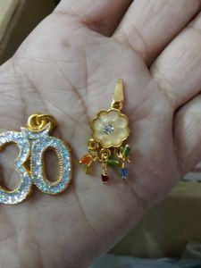 OM and Flower Pendants New