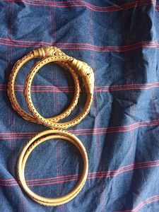 Elegant Gold Tone Bangles - Set of Two