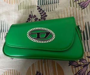 Stunning Green Sling Bag With Embellished Chain
