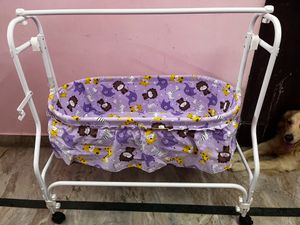 Babyhug, brand new baby cradle with mosquito net