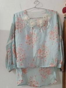 Floral blouse with embellishments