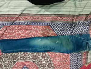 Distressed Blue Jeans