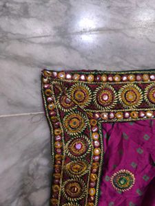 Megenta rajasthani tie-dye saree with bow blouse