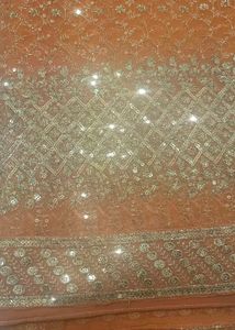 Embroidered Orange Saree And Blouse