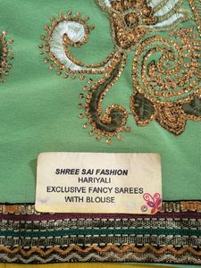Light Green Embroidered Saree