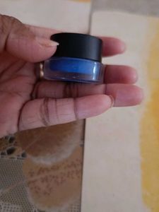 Silver Beaded Bracelet Set and a blue gel eyeliner