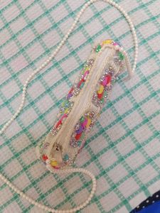 A Sling Bag With Pearls