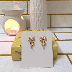 Bow Drop Earrings - Gold Tone