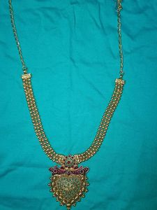 Gold Tone Necklace with Red Accents