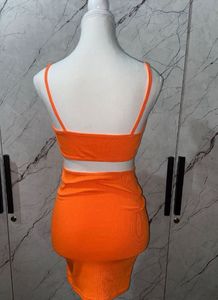 Urbanic Neon Orange Backless Cutout Body Corn Dres